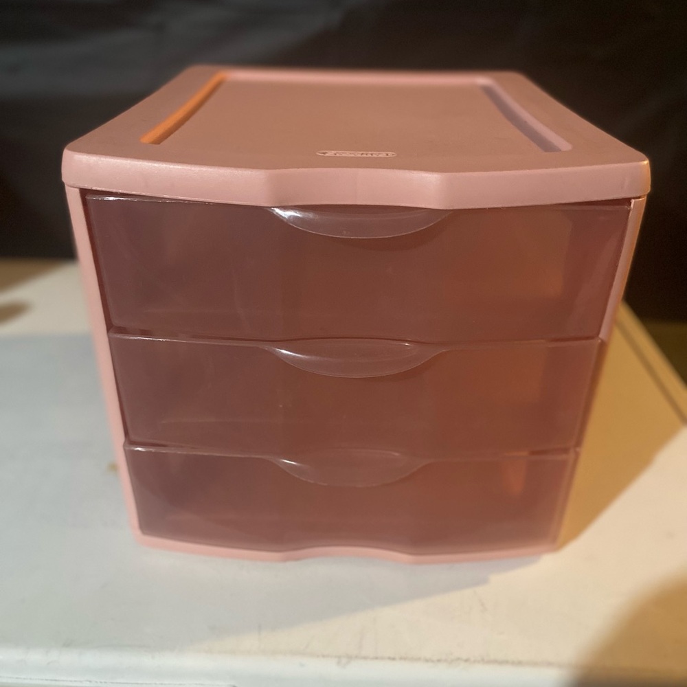 really cute blush pink, real spacious 3 drawer storage bin! used it for 5 months
